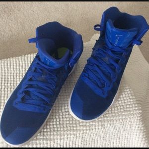 Blue Nike high top.
